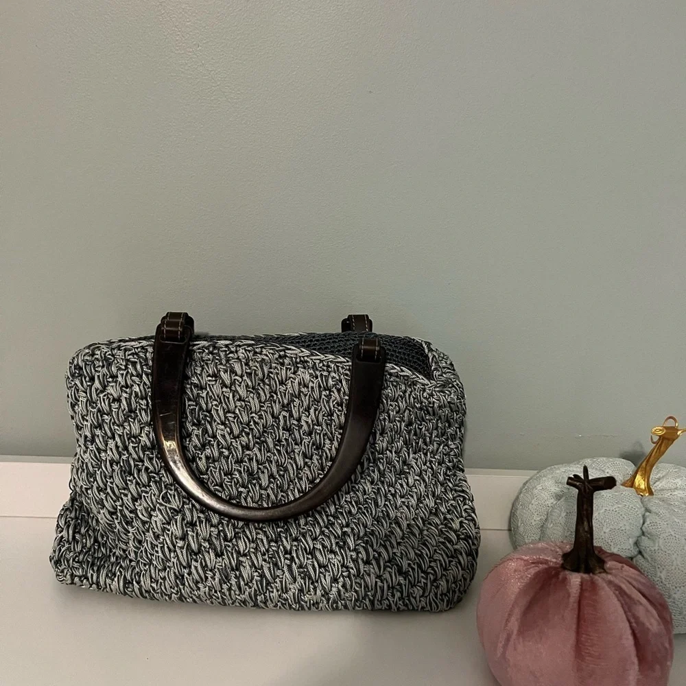 Liz Claiborne Woven Purse.  Bluish Green color.  Has thick plastic handles.